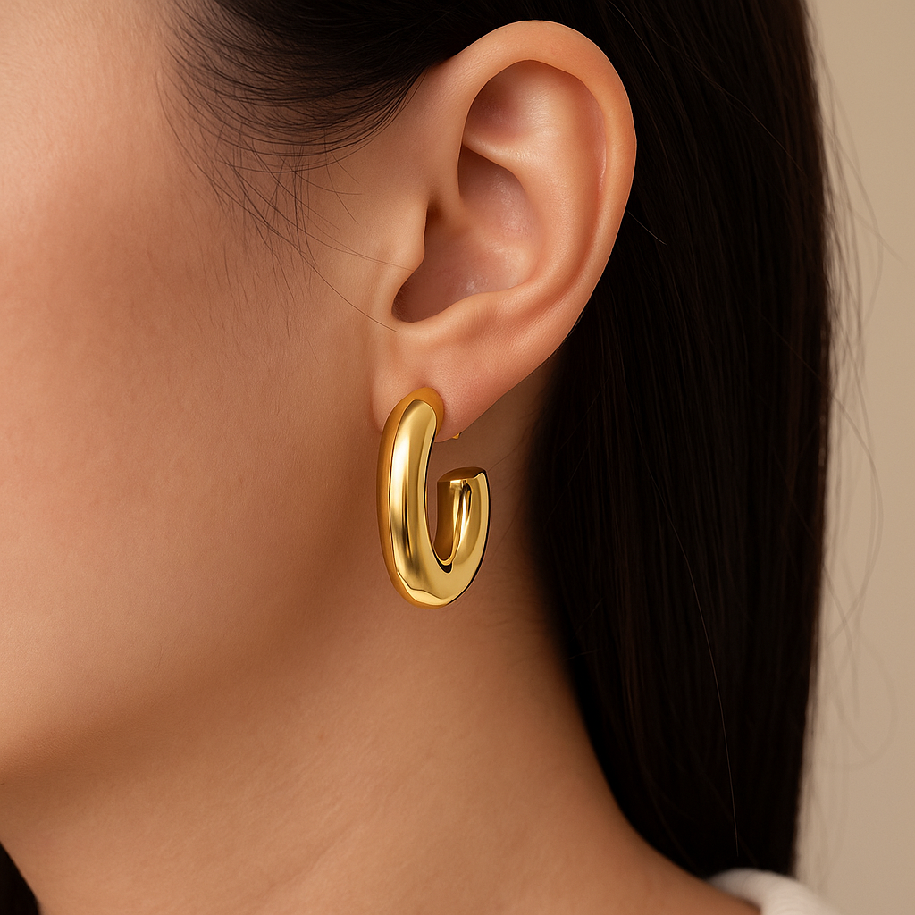Model wearing hoops