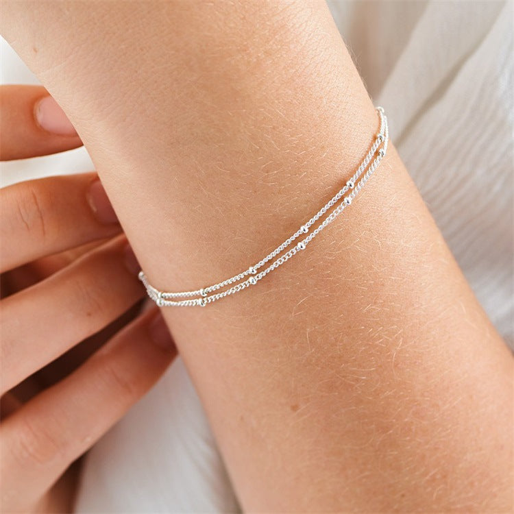 Double Layered Bracelet Showing Hand