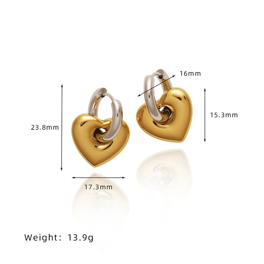 Dual Tone heart-shaped hoop earrings with measurements on a white background