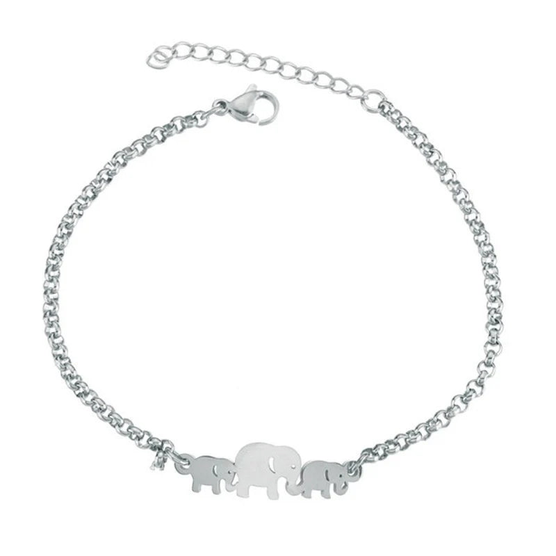 Silver bracelet with elephant charms on a white background