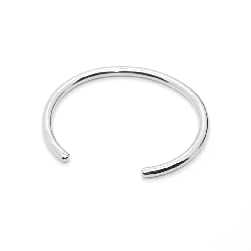 Silver nose ring on a white background