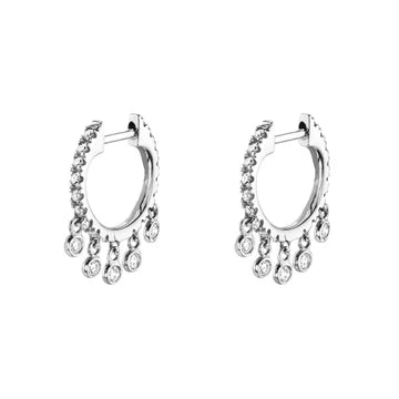Pair of silver hoop earrings with small crystals on a white background